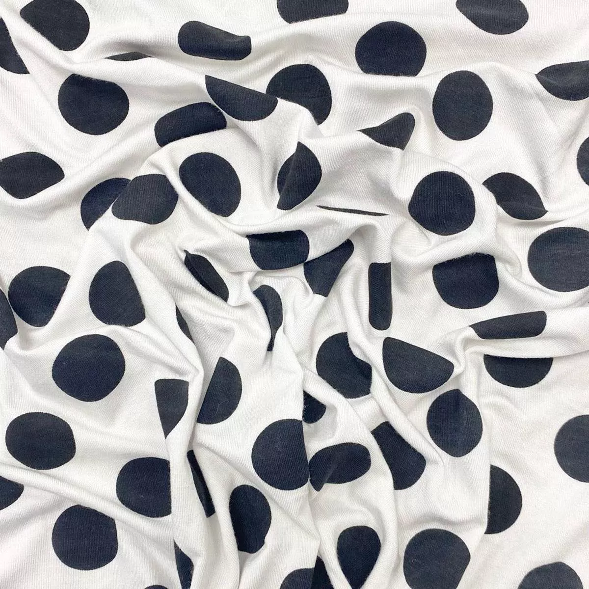 black-spots-on-white-knit-fabric Black Spots on White Knit Fabric