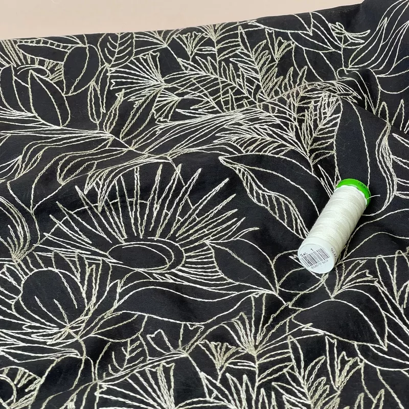 embroidered-tropical-leaves-on-black-cotton-fabric Embroidered Tropical Leaves on Black Cotton Fabric