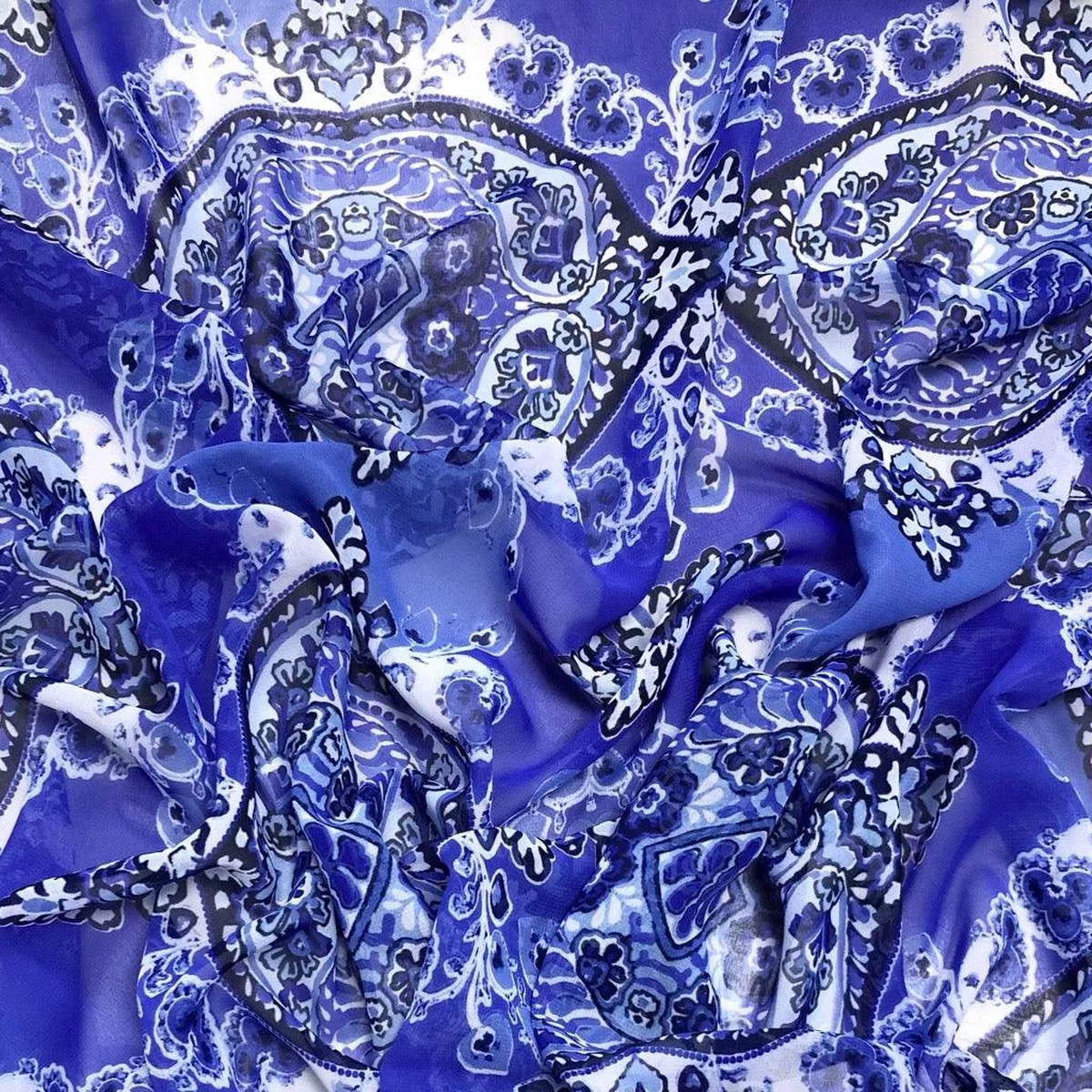 large-symmetrical-design-on-blue-chiffon-fabric Large Symmetrical Design on Blue Chiffon Fabric
