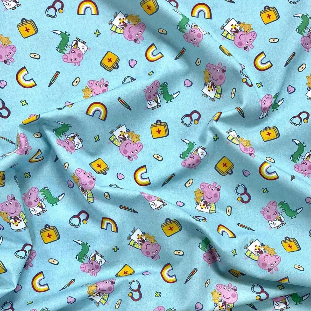 peppa-pig-on-sky-blue-cotton-fabric Peppa Pig on Sky Blue Cotton Fabric